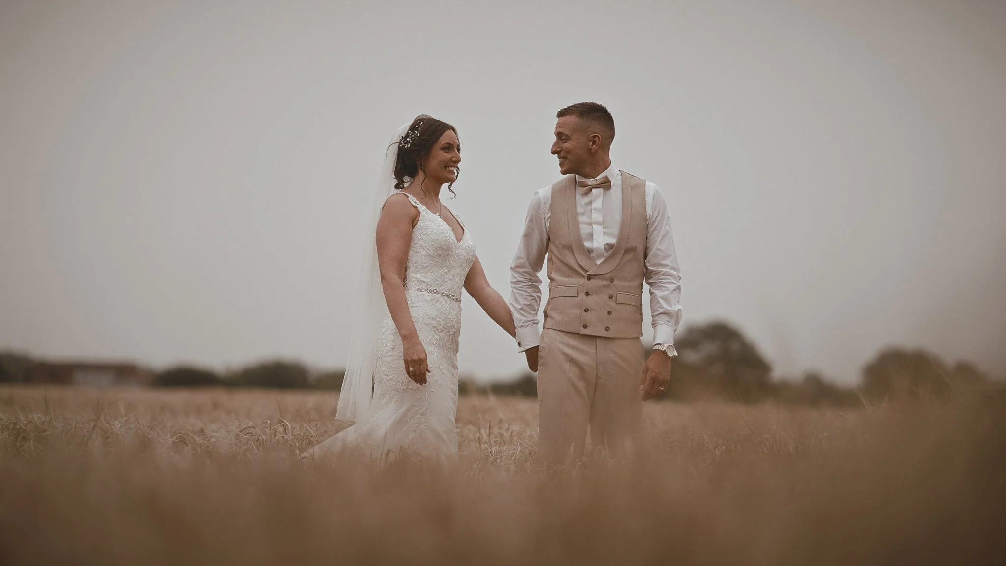 Golden hour couple portraits in the fields at Vaulty Manor in Essex