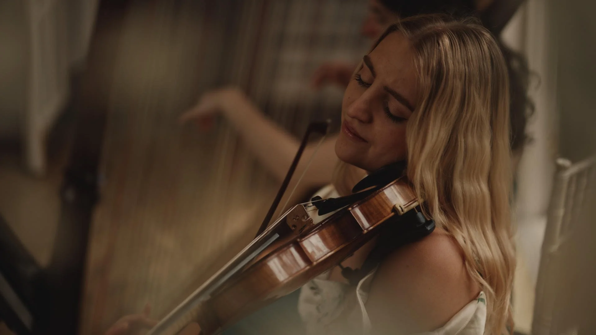 Live music is played during a luxurious black tie wedding day at The Orangery in Maidstone, Kent.