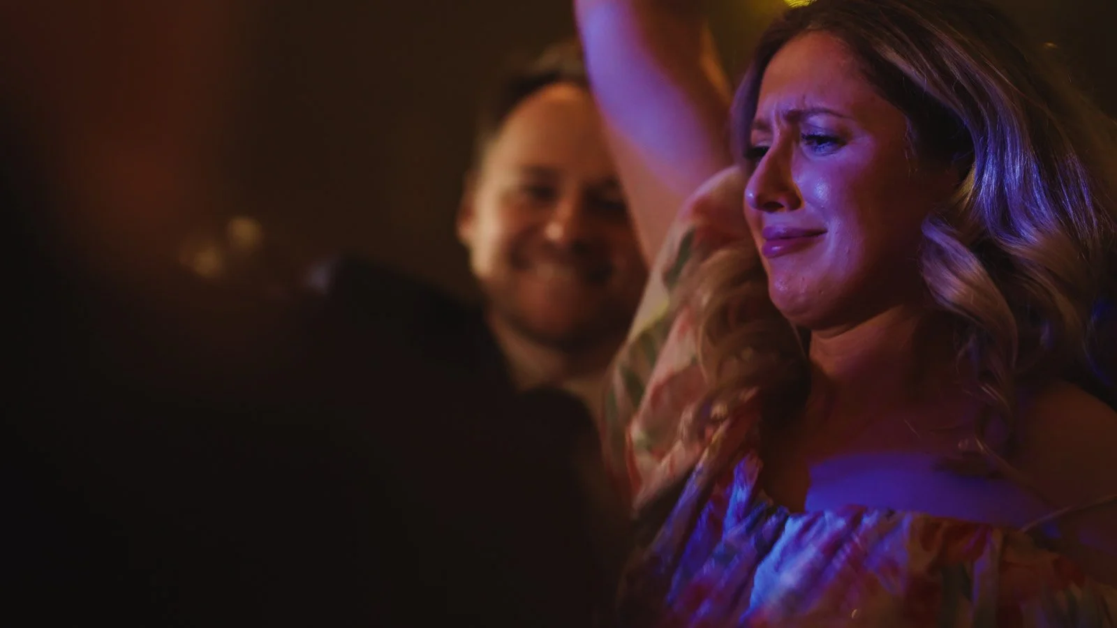 Guests and atmosphere from a colourful riverside wedding with black-tie styling and a marquee party on the Thames.