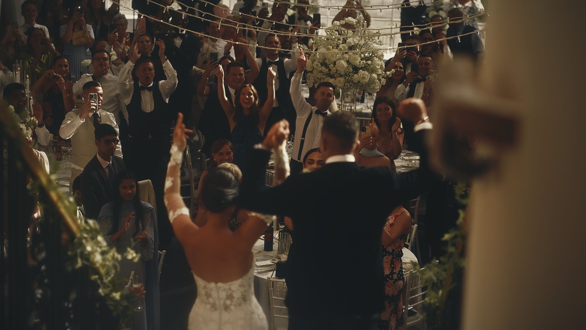 A sweeping staircase entrance into the Atrium reception at Botleys Mansion, creating a cinematic arrival moment.