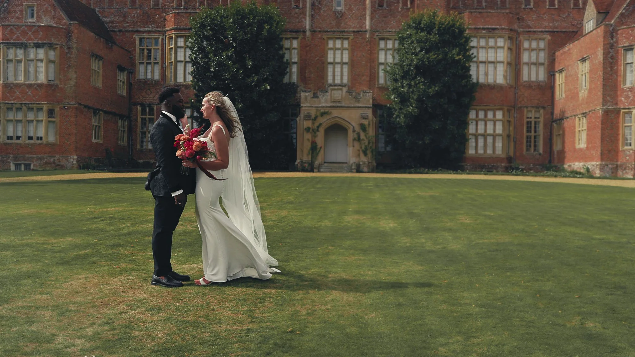 A cinematic wedding videography shot from Mapledurham House, captured by wedding videographer Luke Batchelor Productions