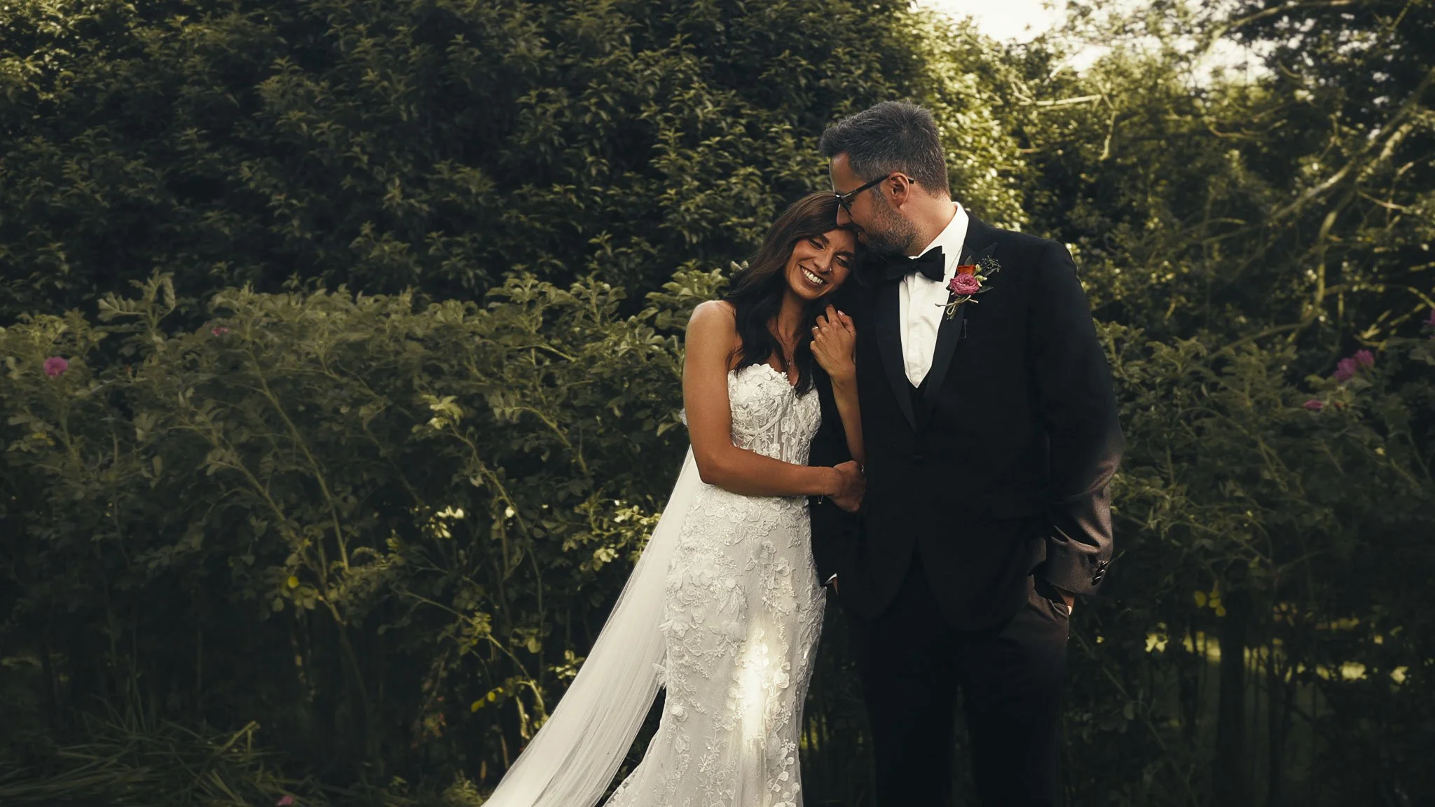 An editorial style couples portrait session from a black tie wedding at The Old Kent Barn, captured by Kent wedding videographer Luke Batchelor Productions.