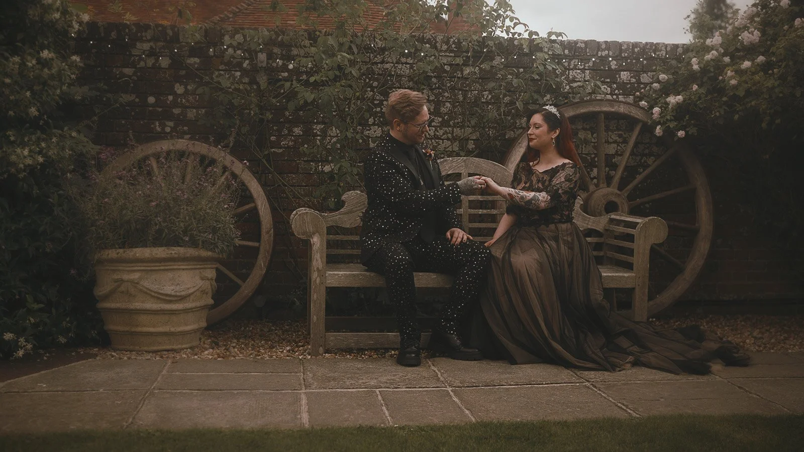 Cinematic still from an alternative Winters Barns wedding film with gothic styling