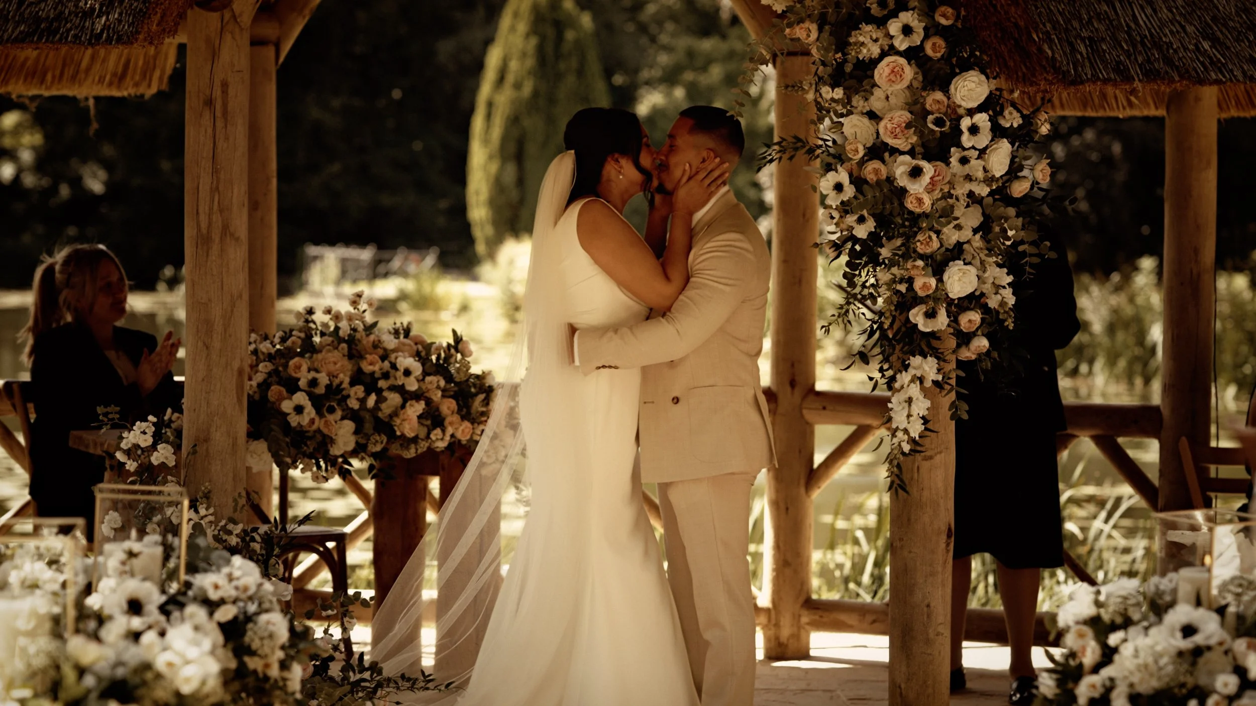 Couple share their first kiss during their ceremony at The Lapa at The Orangery Maidstone