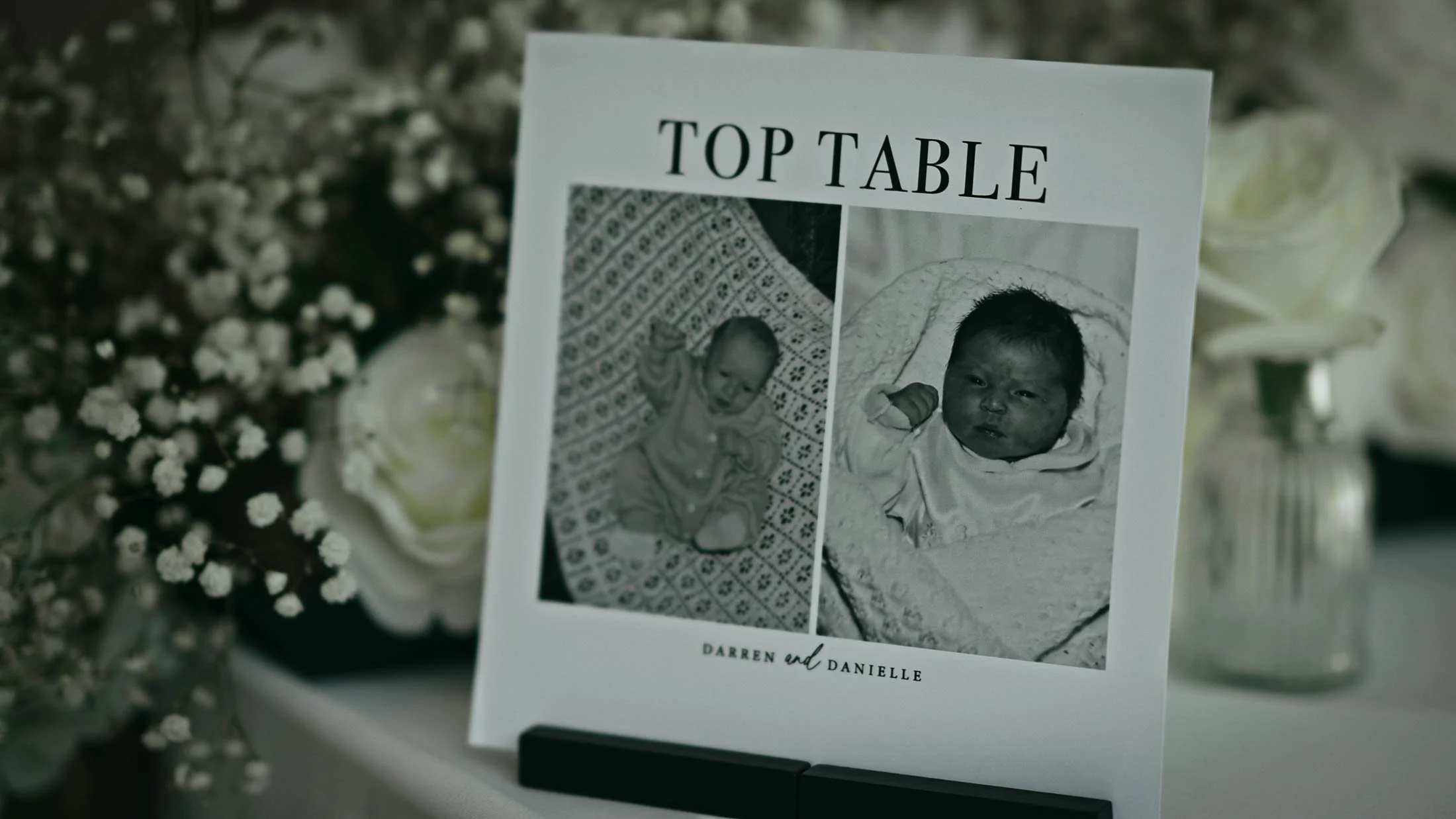 A close up of table decor, details and place settings during a black-tie wedding at The Orangery, Maidstone, as part of a storytelling wedding film.