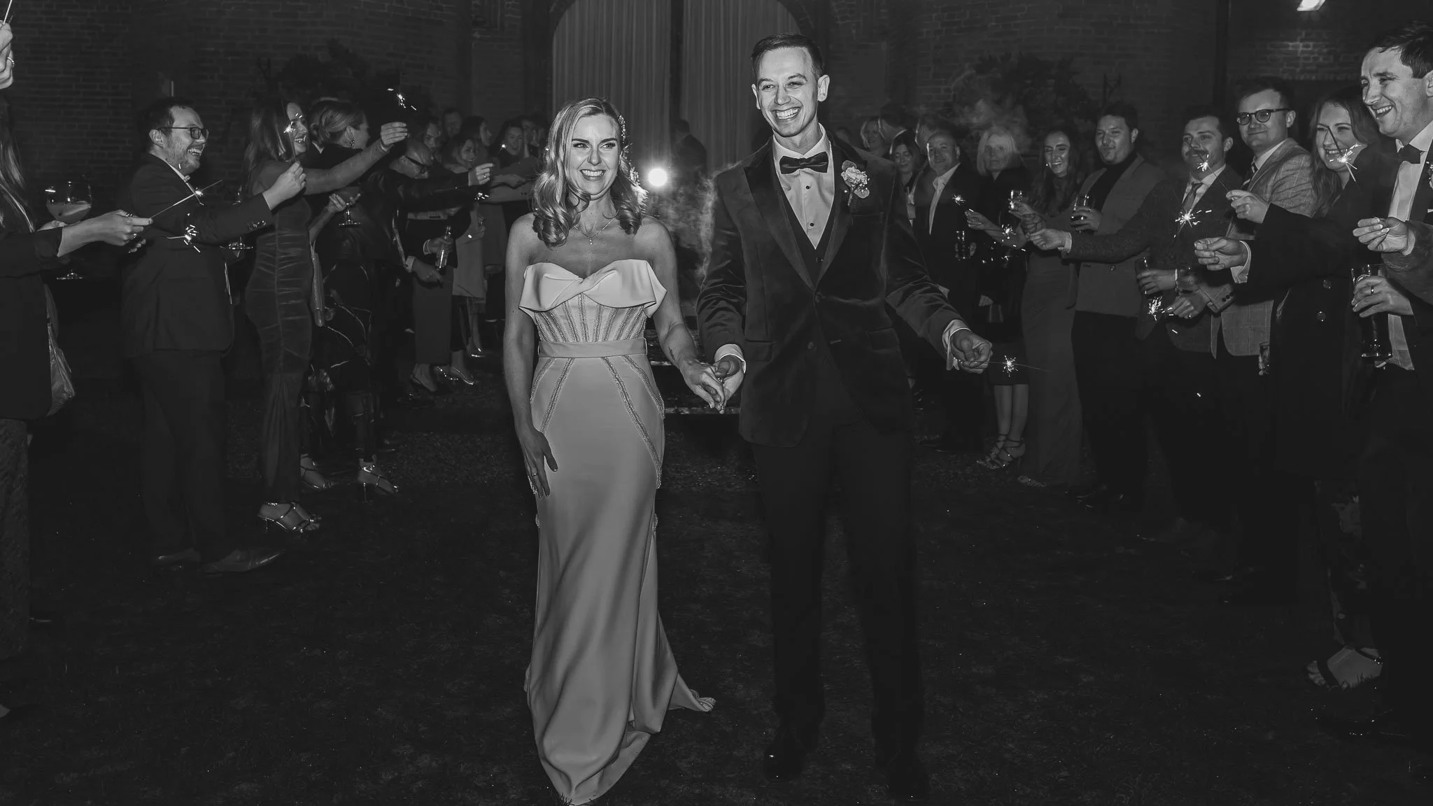 London wedding photography and videography capturing a sparkler exit in an editorial and fine art style.