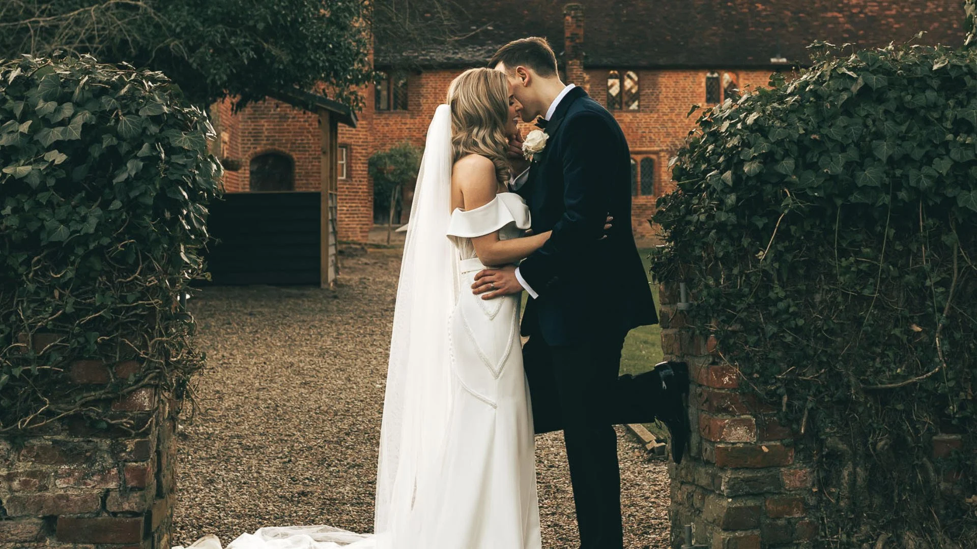 A couple portrait from the Leez Priory wedding venue in Essex, as they give a 5 star review about their wedding videographer Luke Batchelor productions