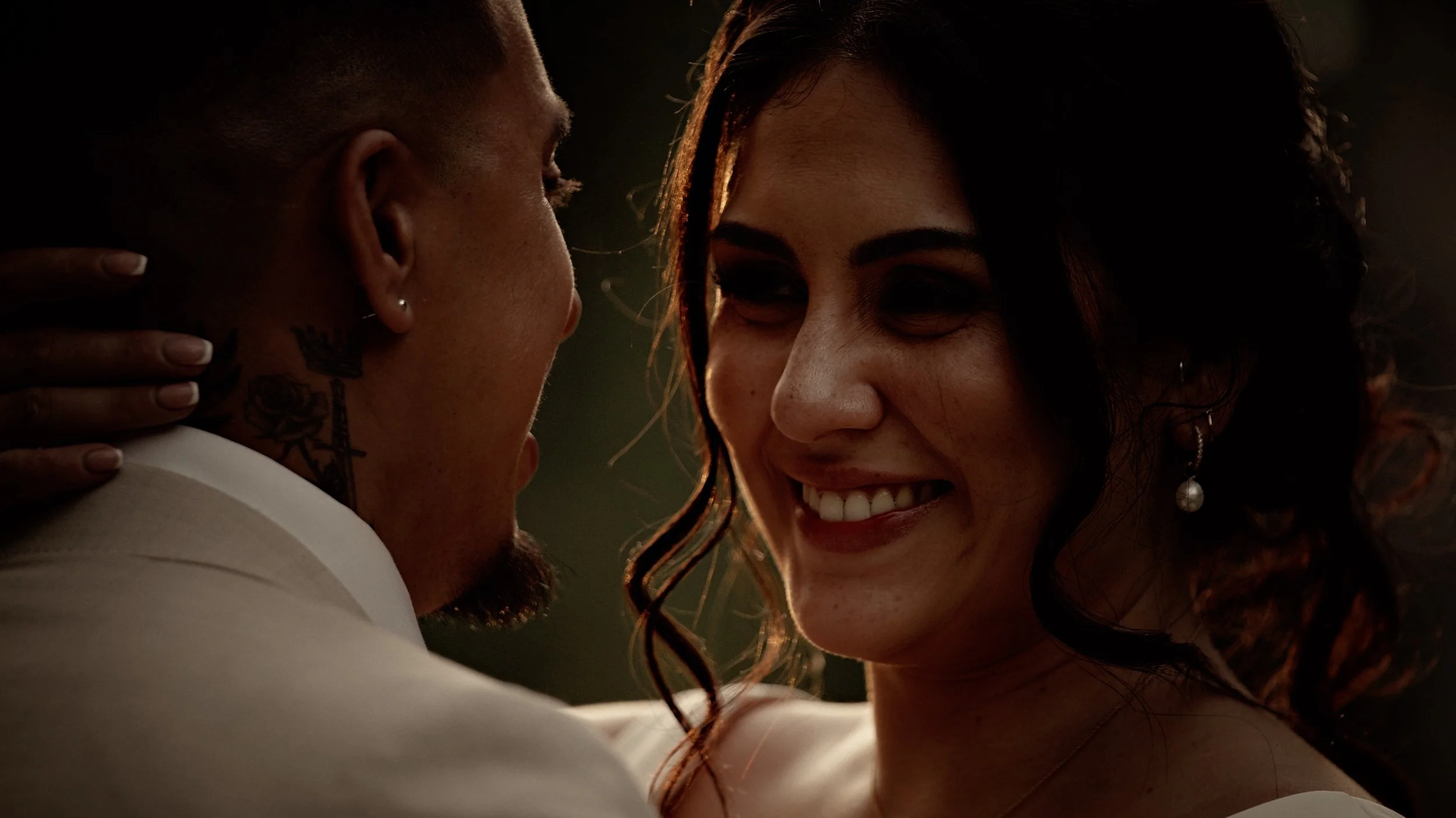 A bride smiles at her groom at The Lapa at The Orangery Maidstone