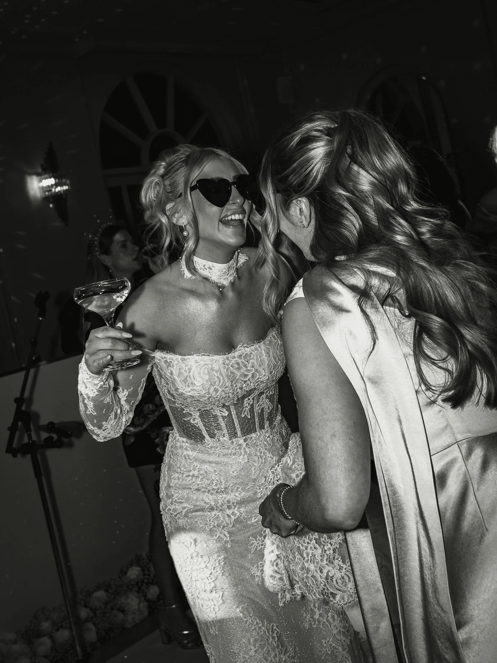 A wedding photography and videography team capture a black and white editorial dance floor moment at the orangery maidstone.