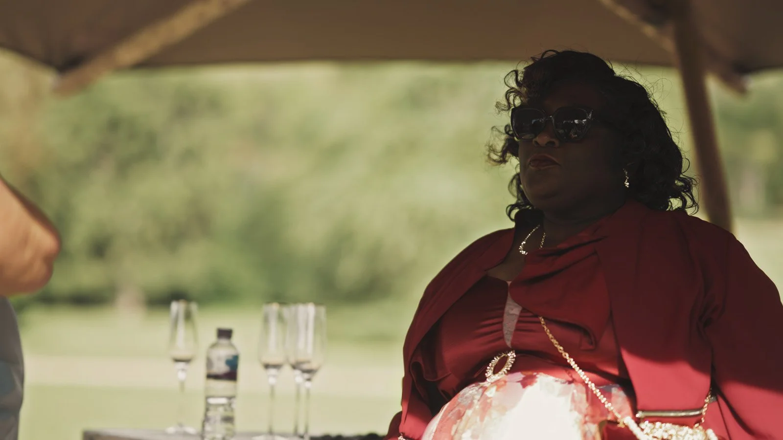 Guests and atmosphere from a colourful riverside wedding with black-tie styling and a marquee party on the Thames.