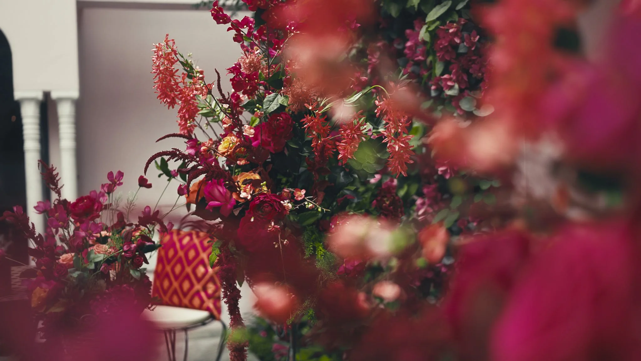 Luxurious pink flower arrangements during a styled wedding shoot in the Moroccan Courtyard at Port Lympne Hotel & Reserve