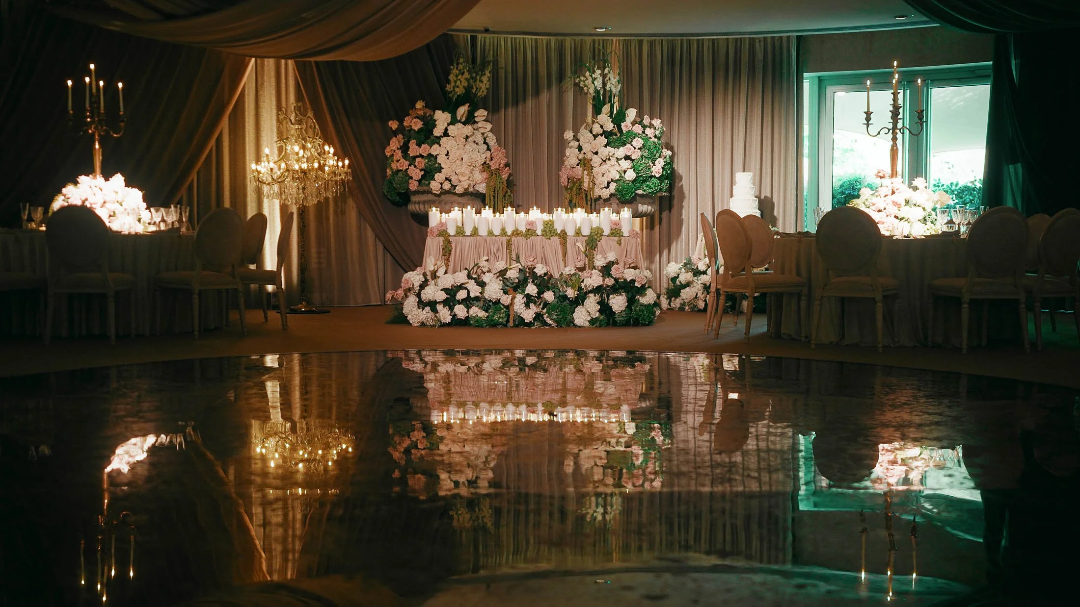 Heavily styled indoor wedding reception decor in the Grantley Suite at a Grantley Hall wedding in Yorkshire.
