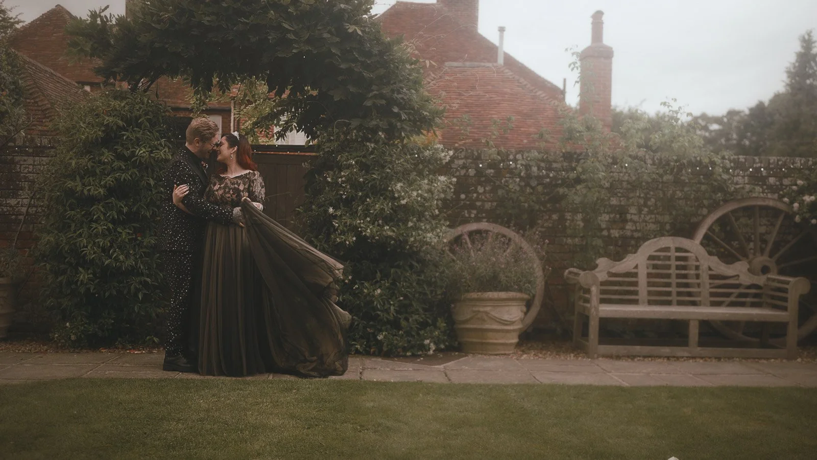 Editorial couples portrait of a gothic-inspired bride and groom at Winters Barns in Kent.