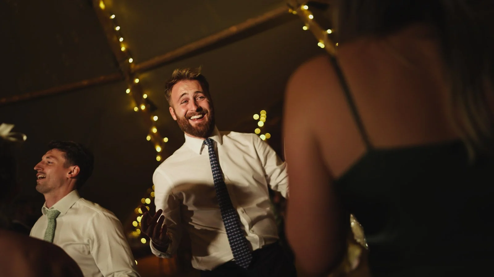 Candid moments from a colourful riverside wedding on the River Thames at an Oxfordshire country estate.