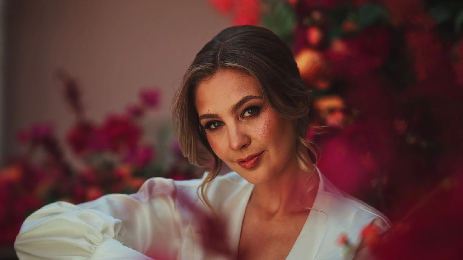 Fashion-led bridal portrait with strong colour story and calm composition 