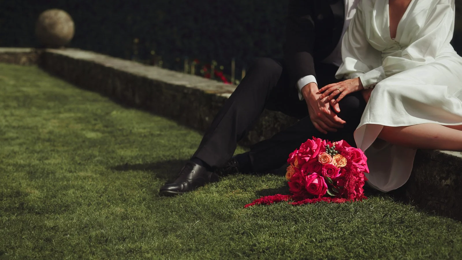 Saturated bouquet detail with texture and layered colour in natural, outdoor lighting.