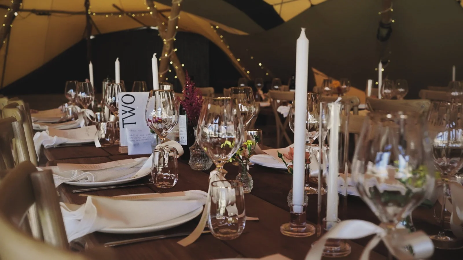 Details and candid scenes from a colourful riverside wedding video at an Oxfordshire estate beside the River Thames.