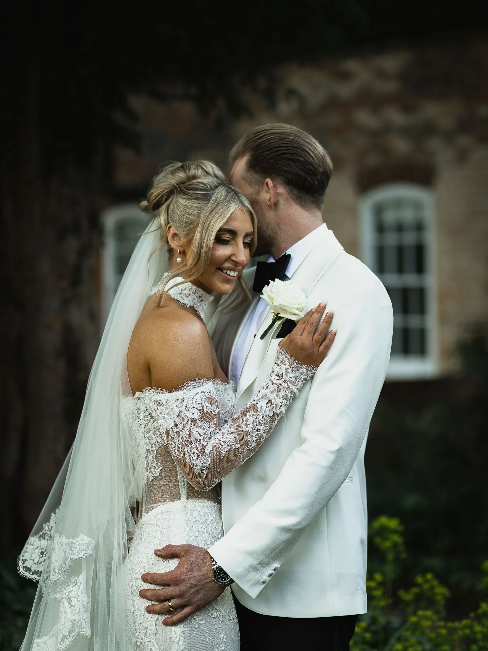 Wedding photography and videography at the orangery Maidstone with bride and groom portraits in an editorial style.