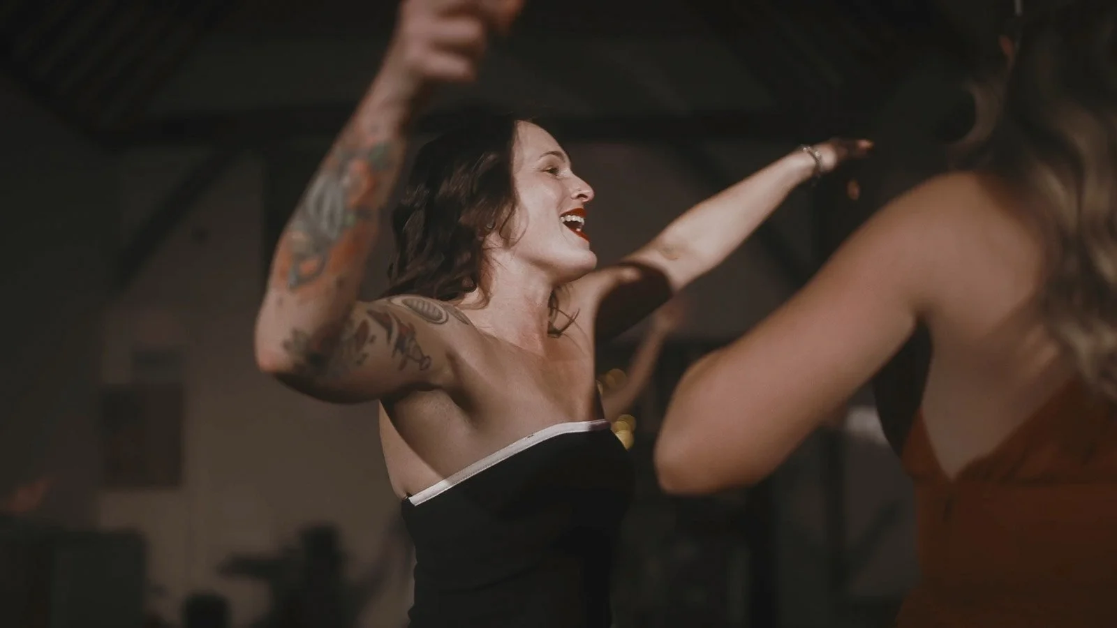 Dancing and high-energy moments during a colourful Winters Barns wedding film in Canterbury.