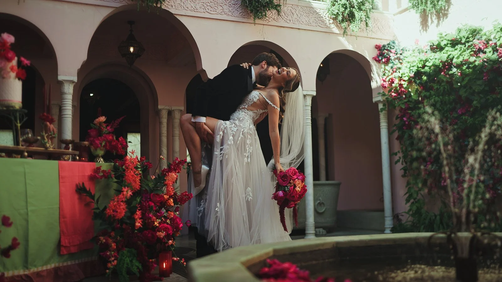 Natural laughter during portraits with a bride and groom, wedding photography and videography captured unobtrusively