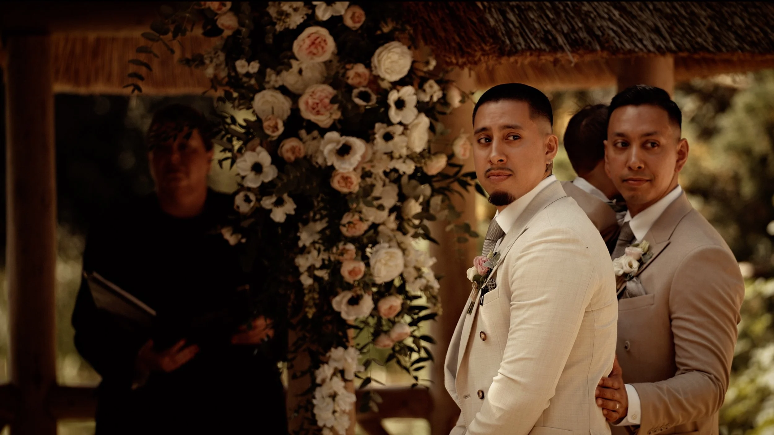The grooms reaction as he turns around to see his bride during a lakeside wedding ceremony at the Lapa at The Orangery, Maidstone.