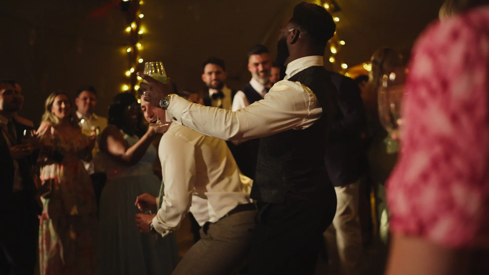 Candid moments from a colourful riverside wedding on the River Thames at an Oxfordshire country estate.