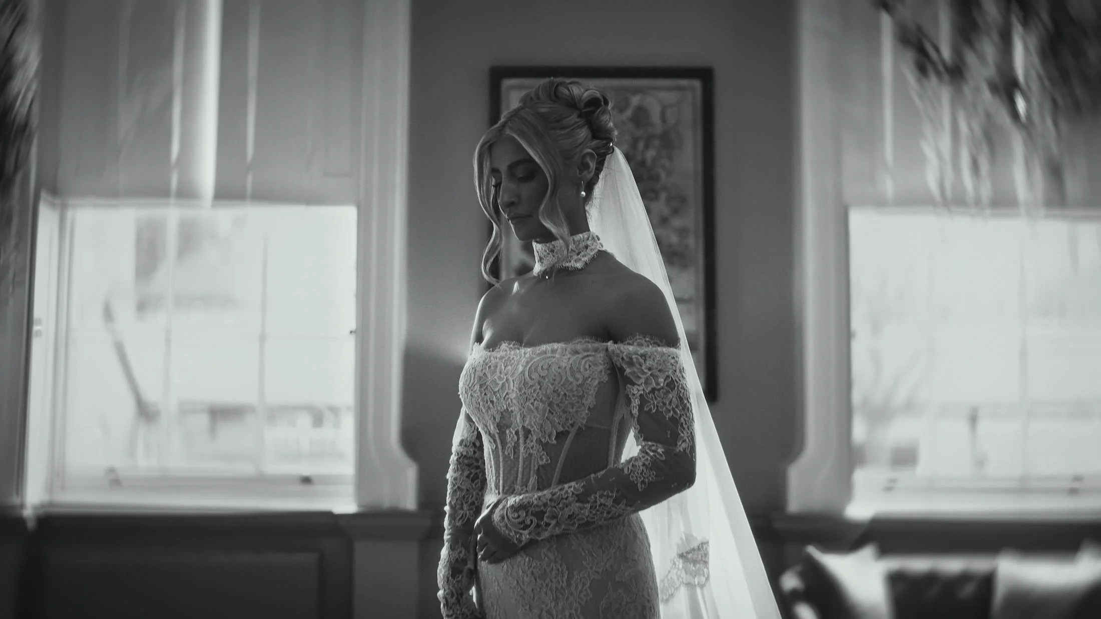 A black and white bridal portrait taken from a cinematic storytelling wedding film in the UK.