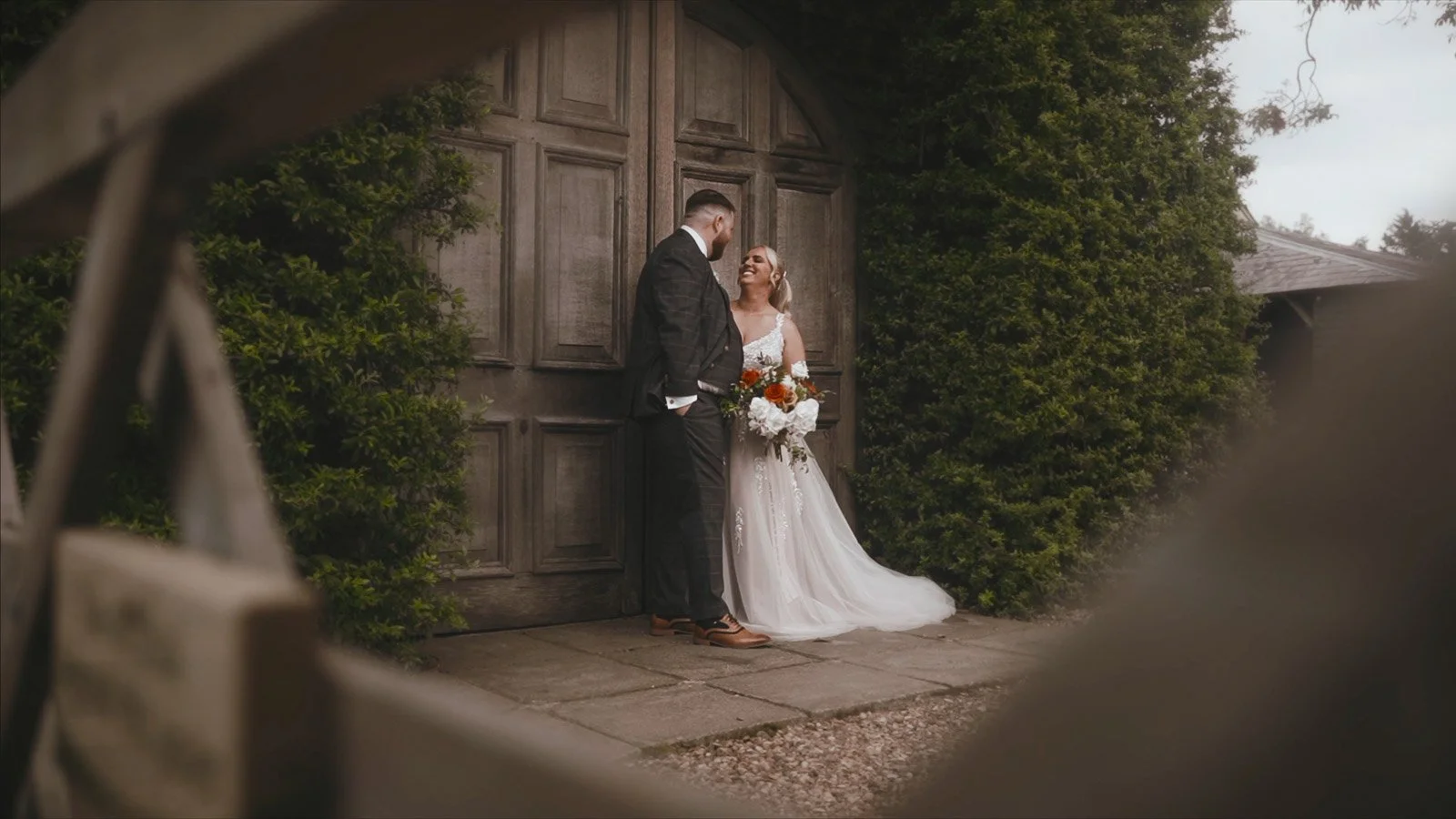 Rachel and Ryan’s Winters Barns wedding film gallery image with warm sunset tones and a relaxed, joyful feel.