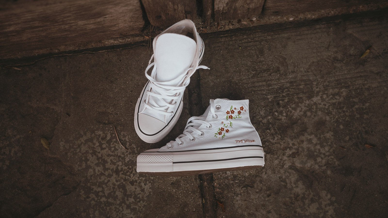 A brides shoes laid out for an editorial shot from a colourful wedding film at Winters Barns.