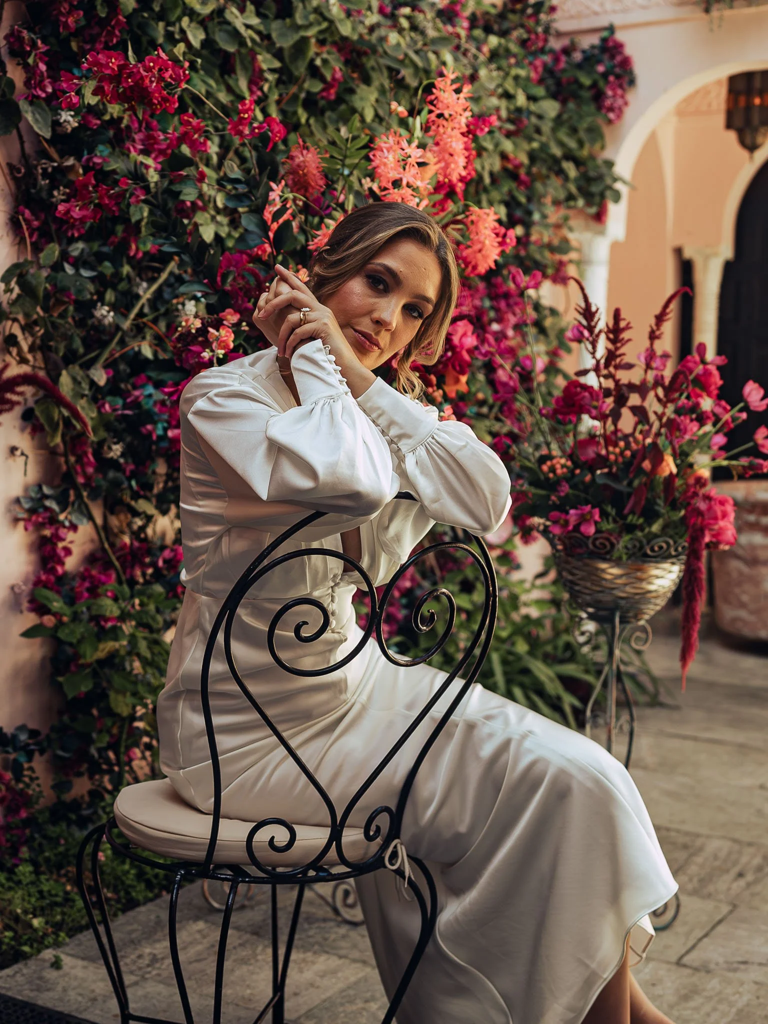 A portrait of a bride during. aluxury pink-themed styled shoot at Port Lympne Hotel