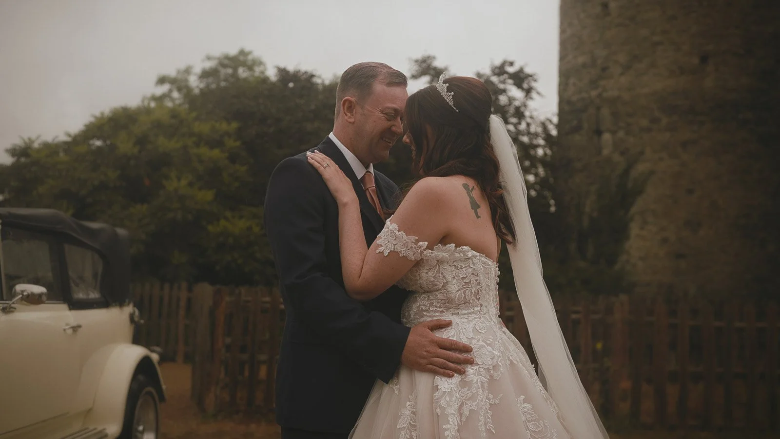 Couple portraits on a quiet country lane near Cooling Castle Barn wedding venue
