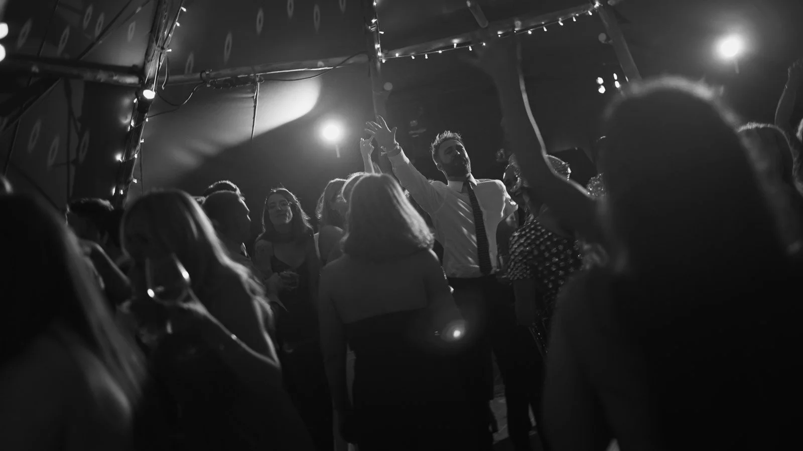 Candid moments from a colourful riverside wedding on the River Thames at an Oxfordshire country estate.