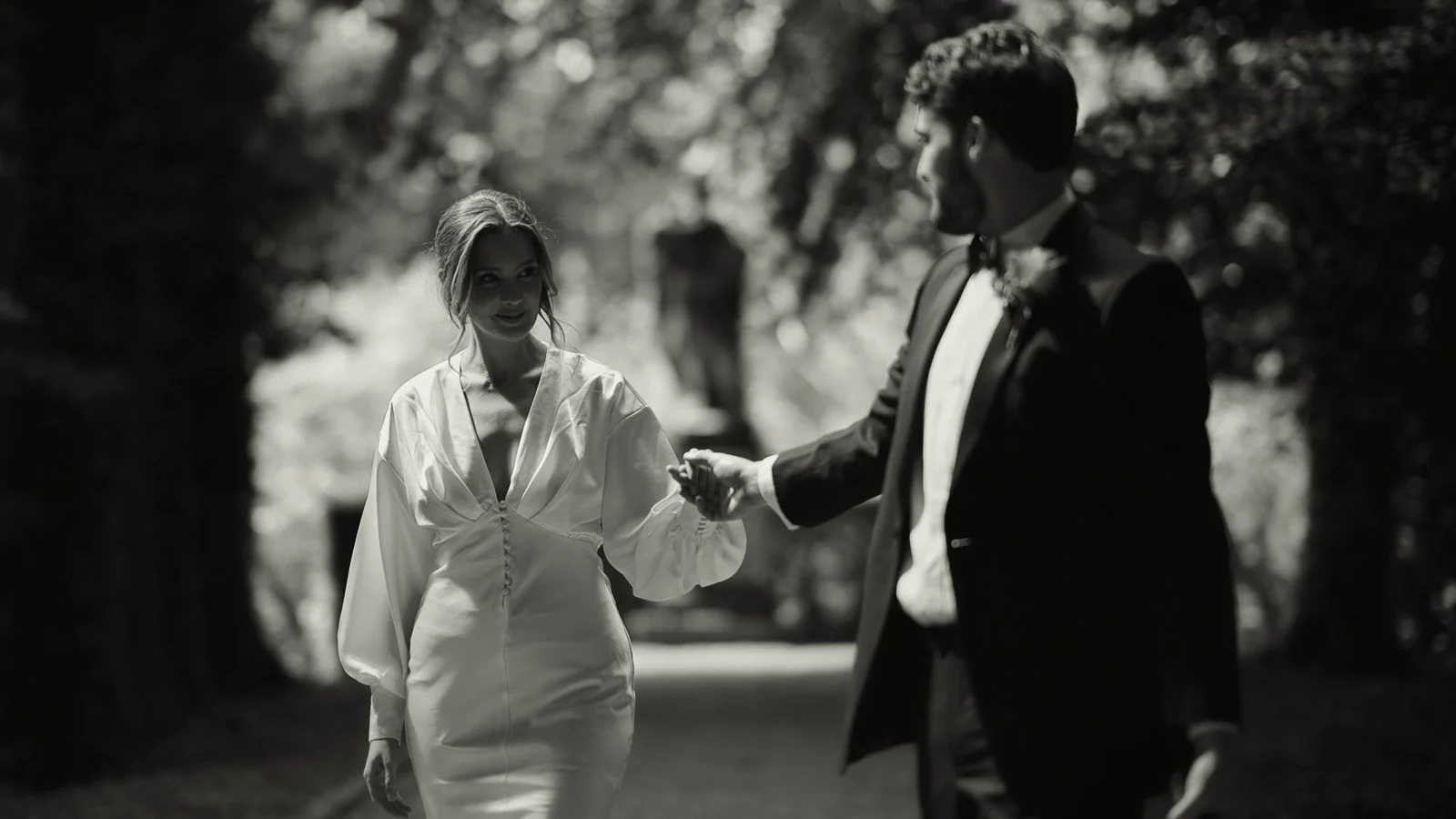 Editorial wedding portrait with vivid florals and refined composition