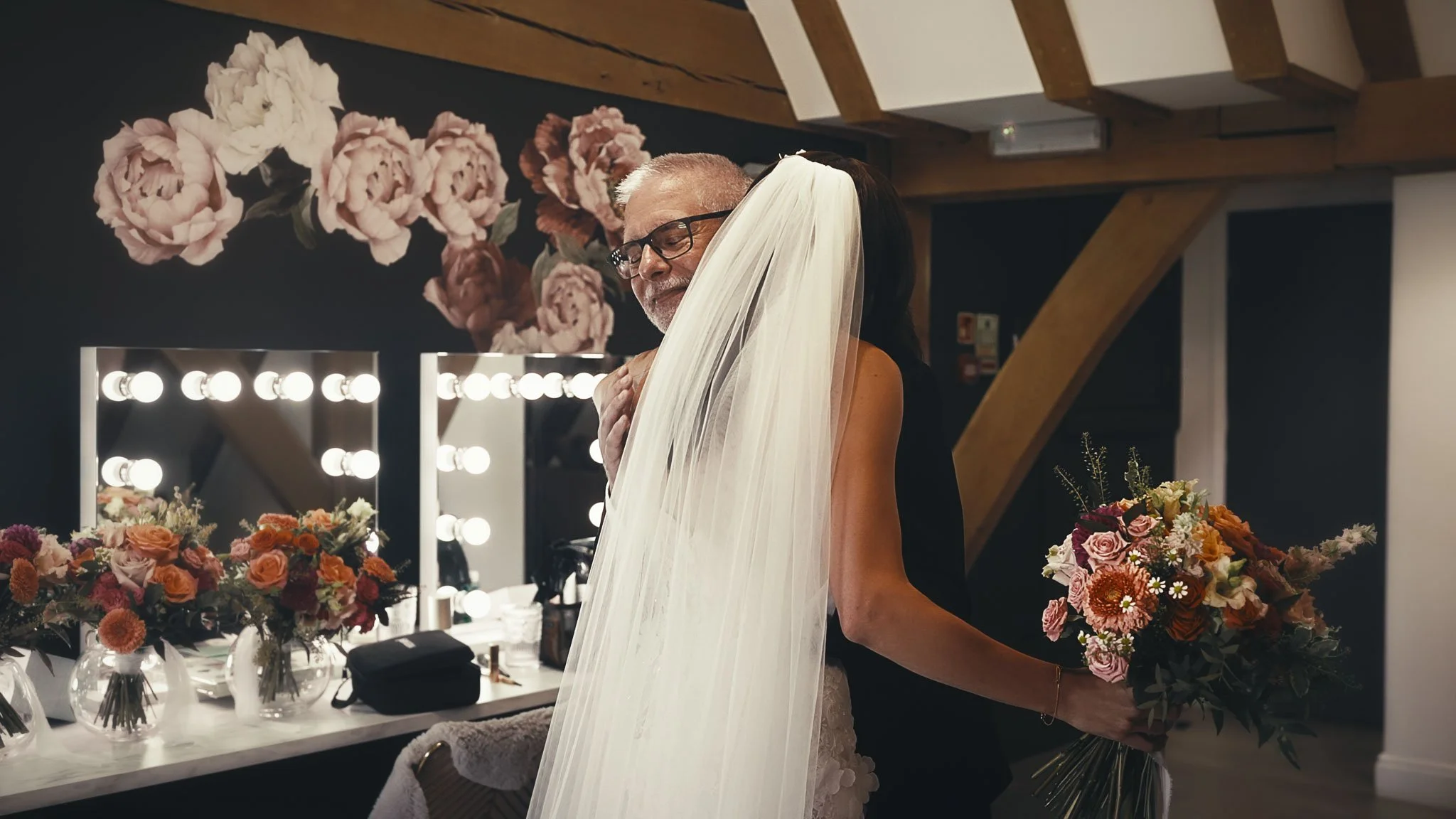 Wedding morning bridal preparations and detail shots from a black tie wedding video shot at The Old Kent Barn.