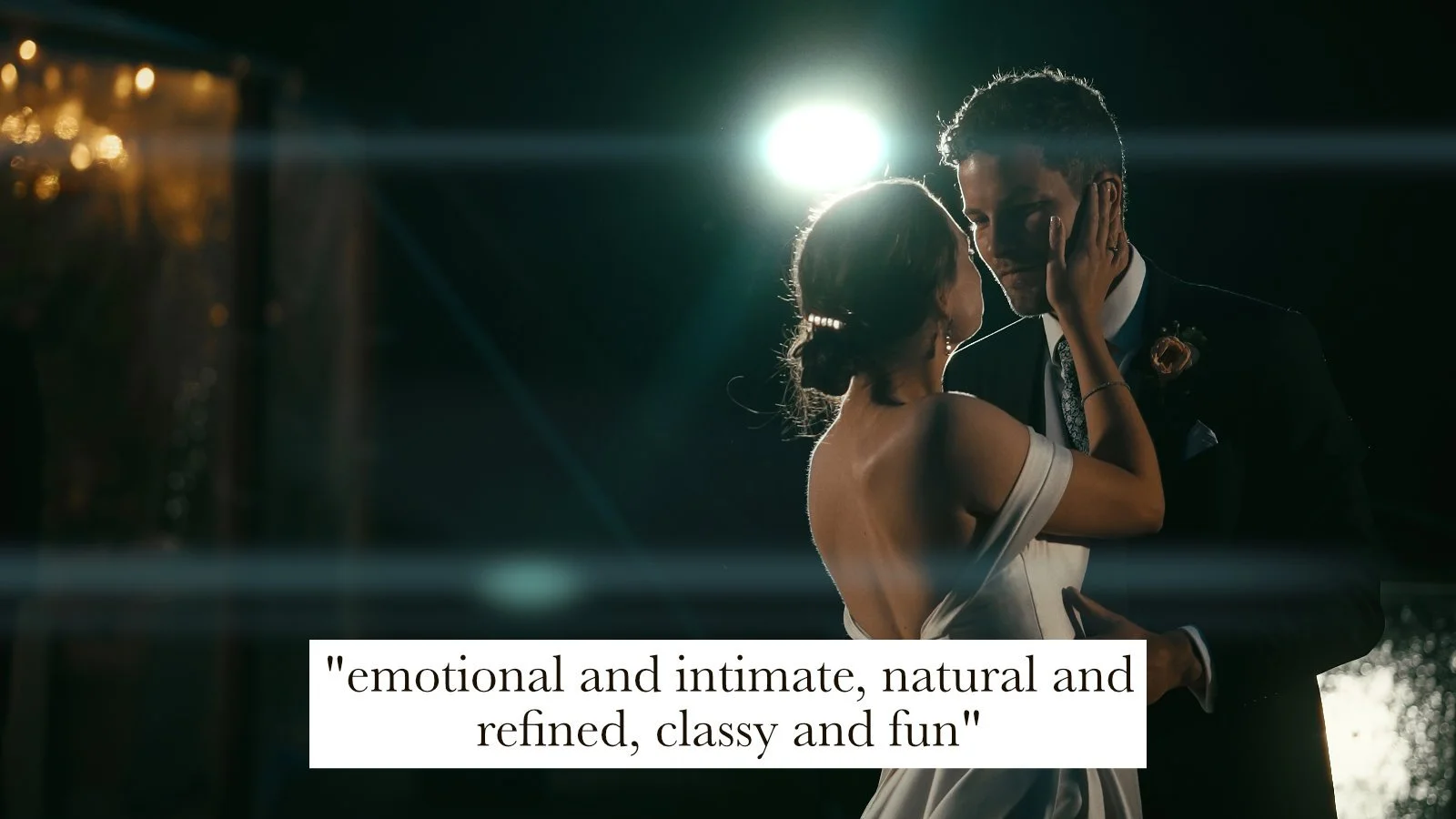 A bride and groom during their first dance at night with a cinematic lens flare. A caption read "emotional and intimate, natural and refined, classy and fun" as part of an explanation of editorial wedding films.