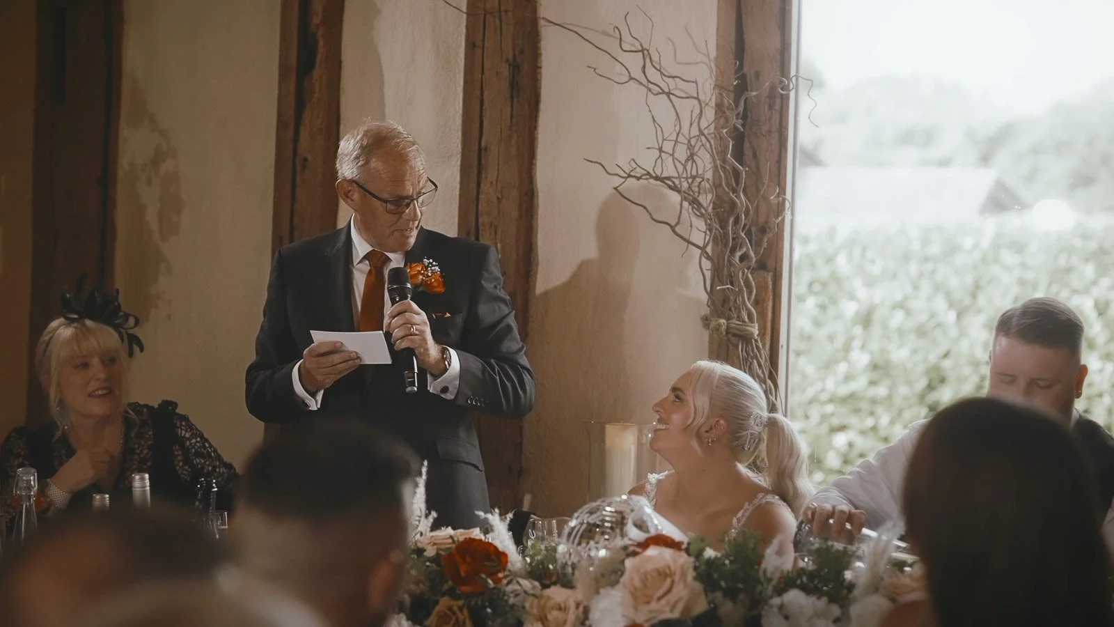 The father of the bride delivers a heartwarming and emotional speech in the main barn at Winters Barns, Canterbury.