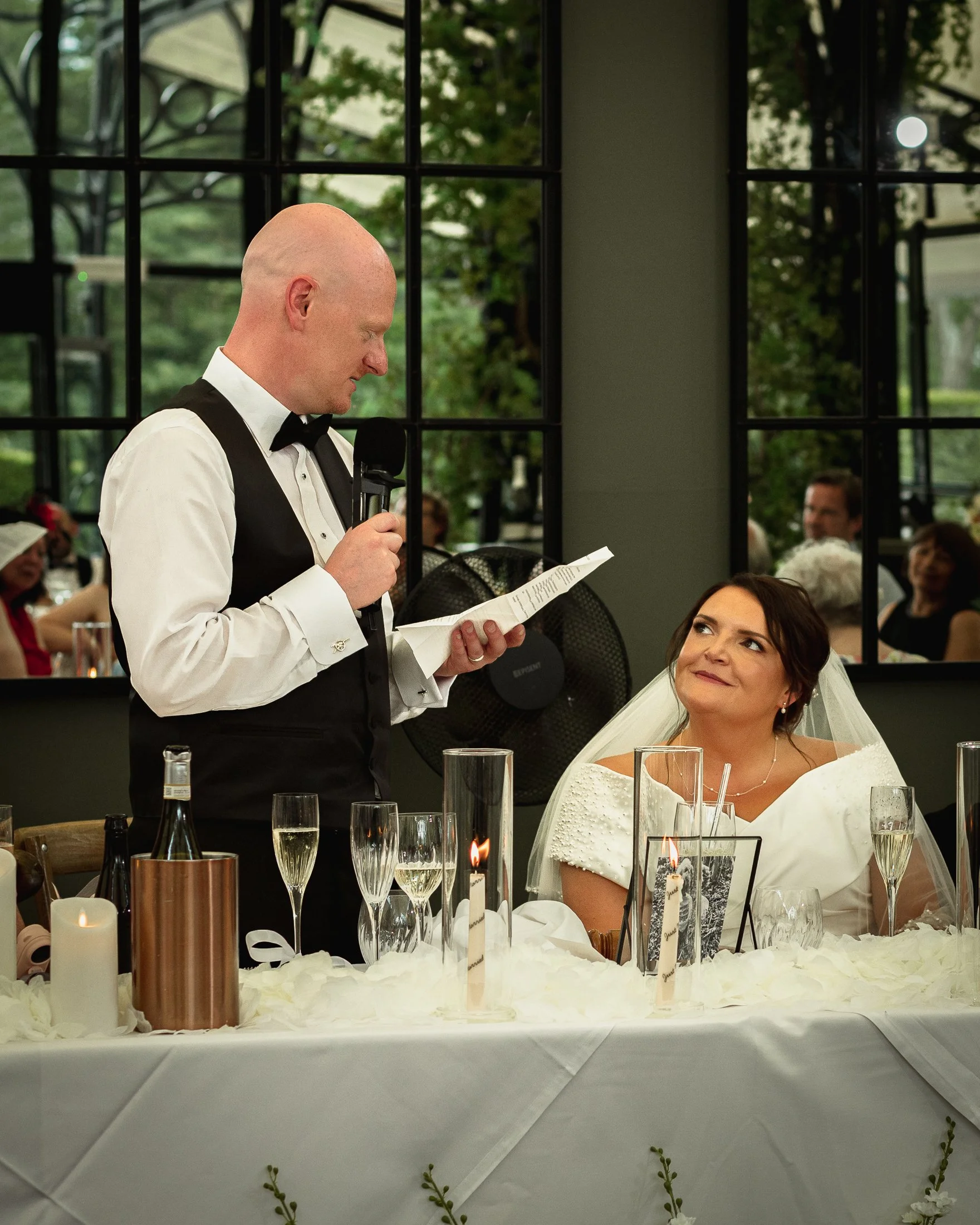 Luke delivers his wedding speech to Lucy in the Glass Orangery at Port Lympne Hotel.