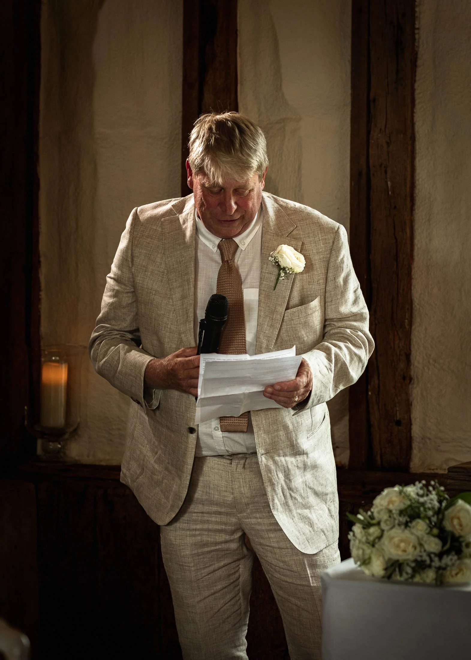 A portrait of the Father of the Bride as he delivers a heartfelt wedding speech at Winters Barns in kent.