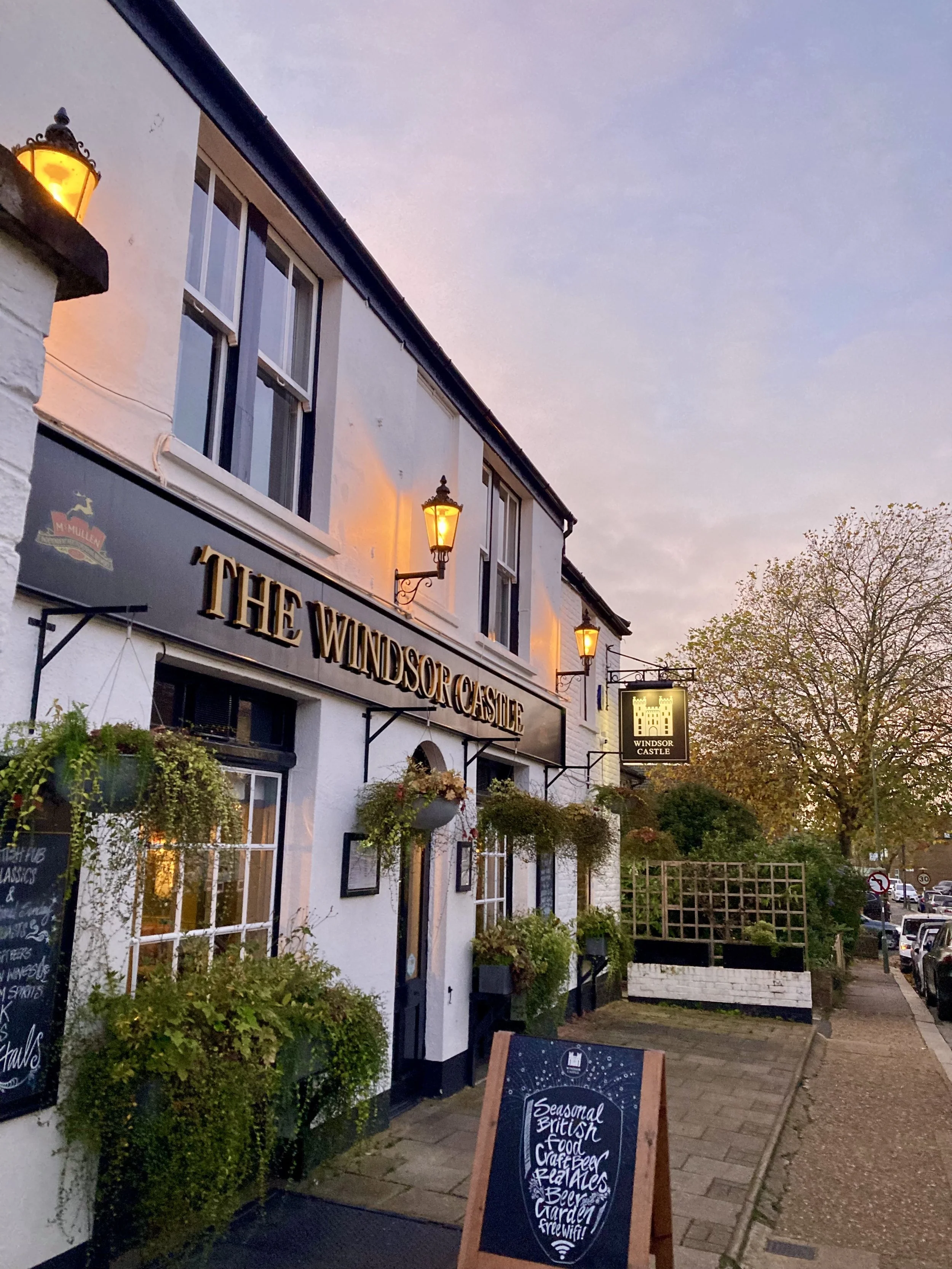 Photo of the front of the pub taken at dusk