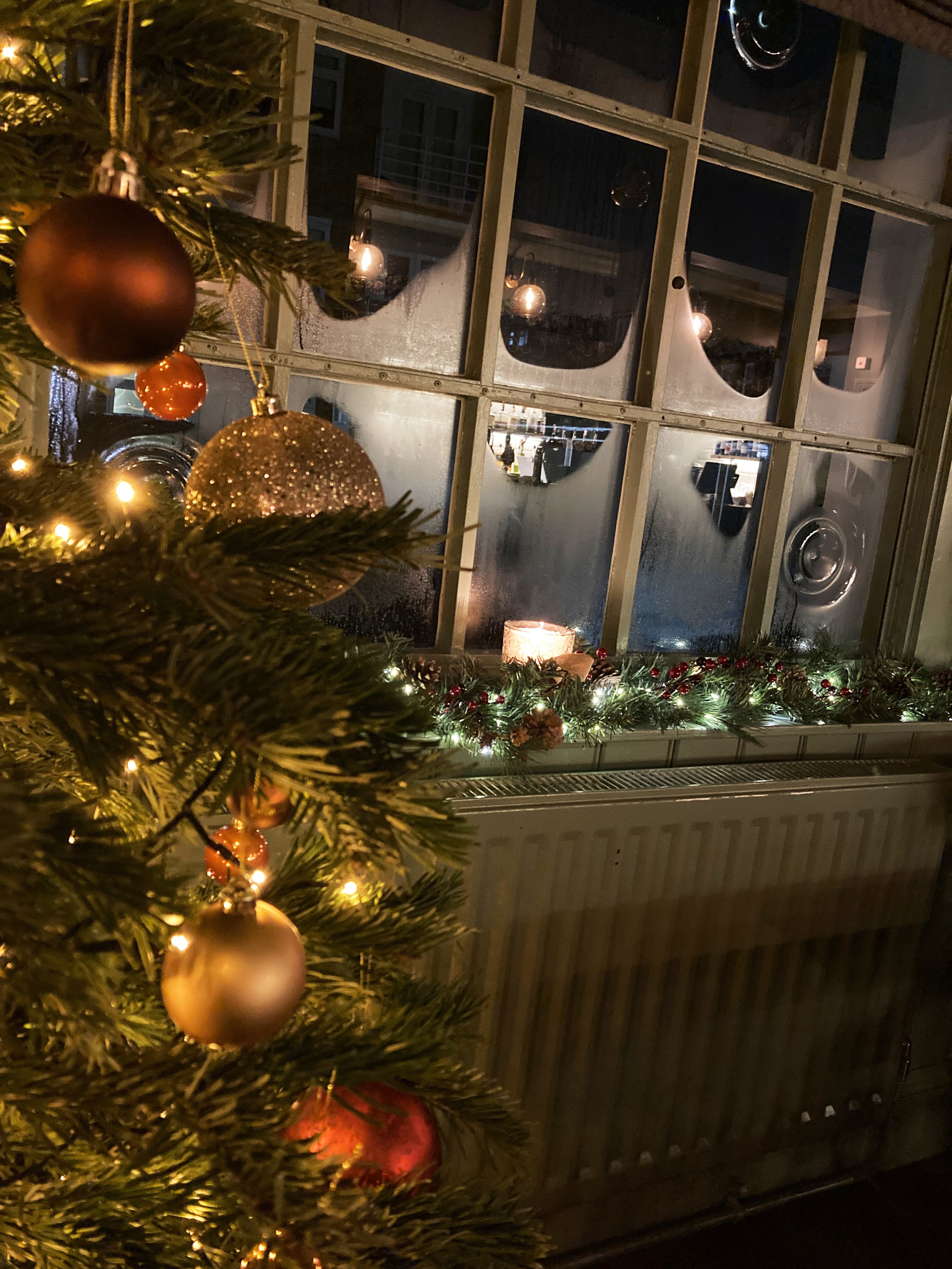Decorated Christmas tree in The Windsor Castle pub in East Finchley