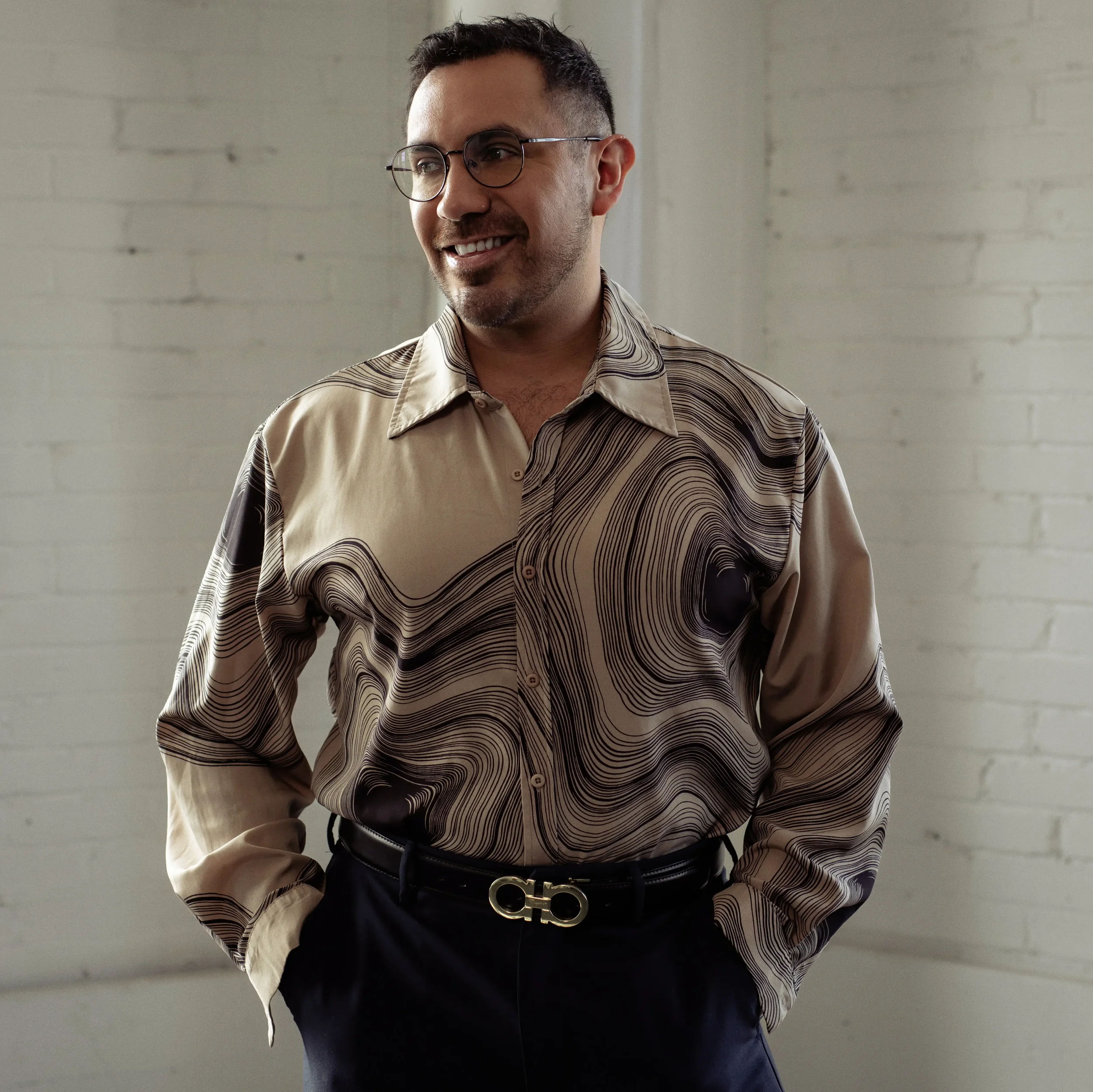 Headshot profile photo of Jon Ramirez posing