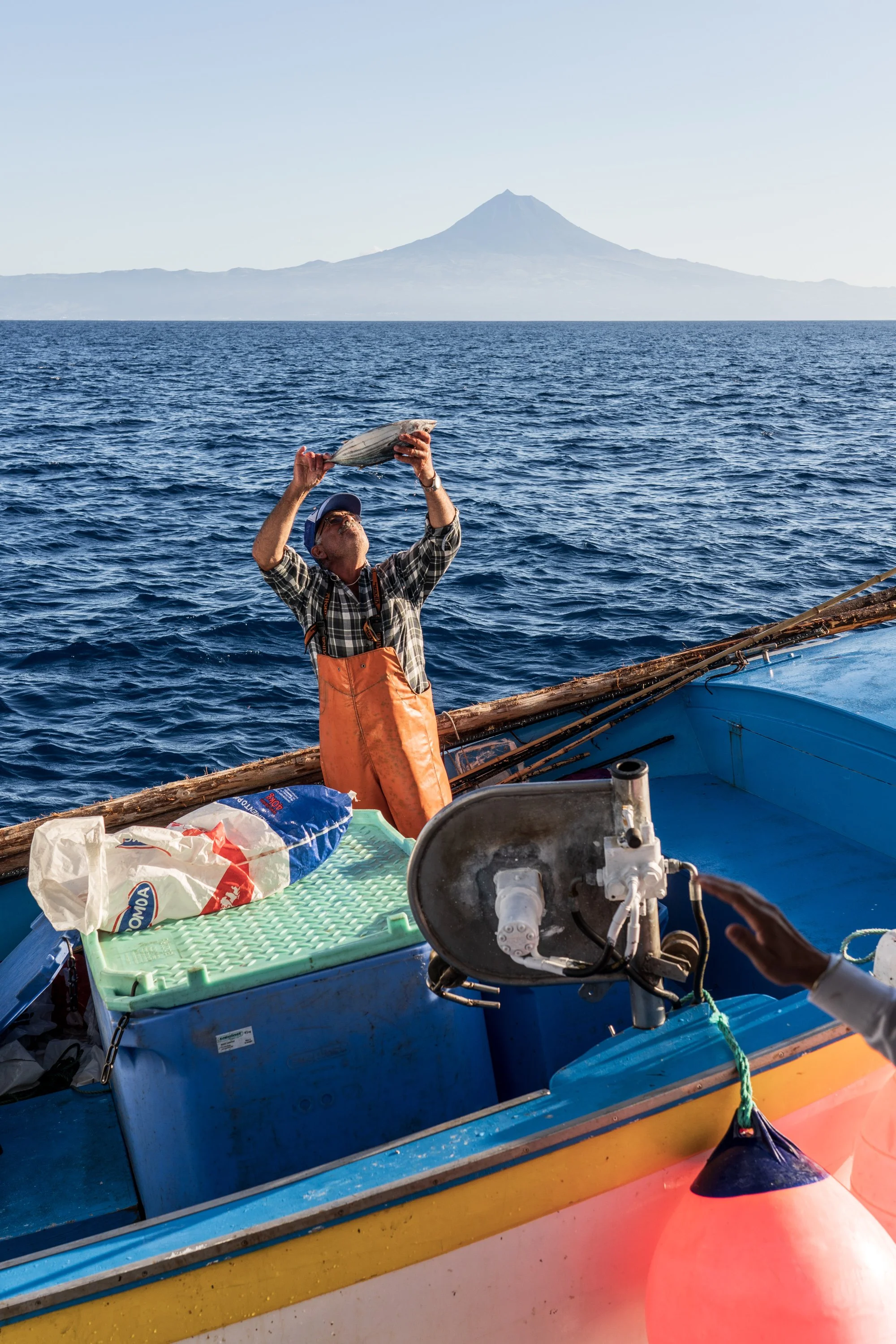 fisherman showing of his catch