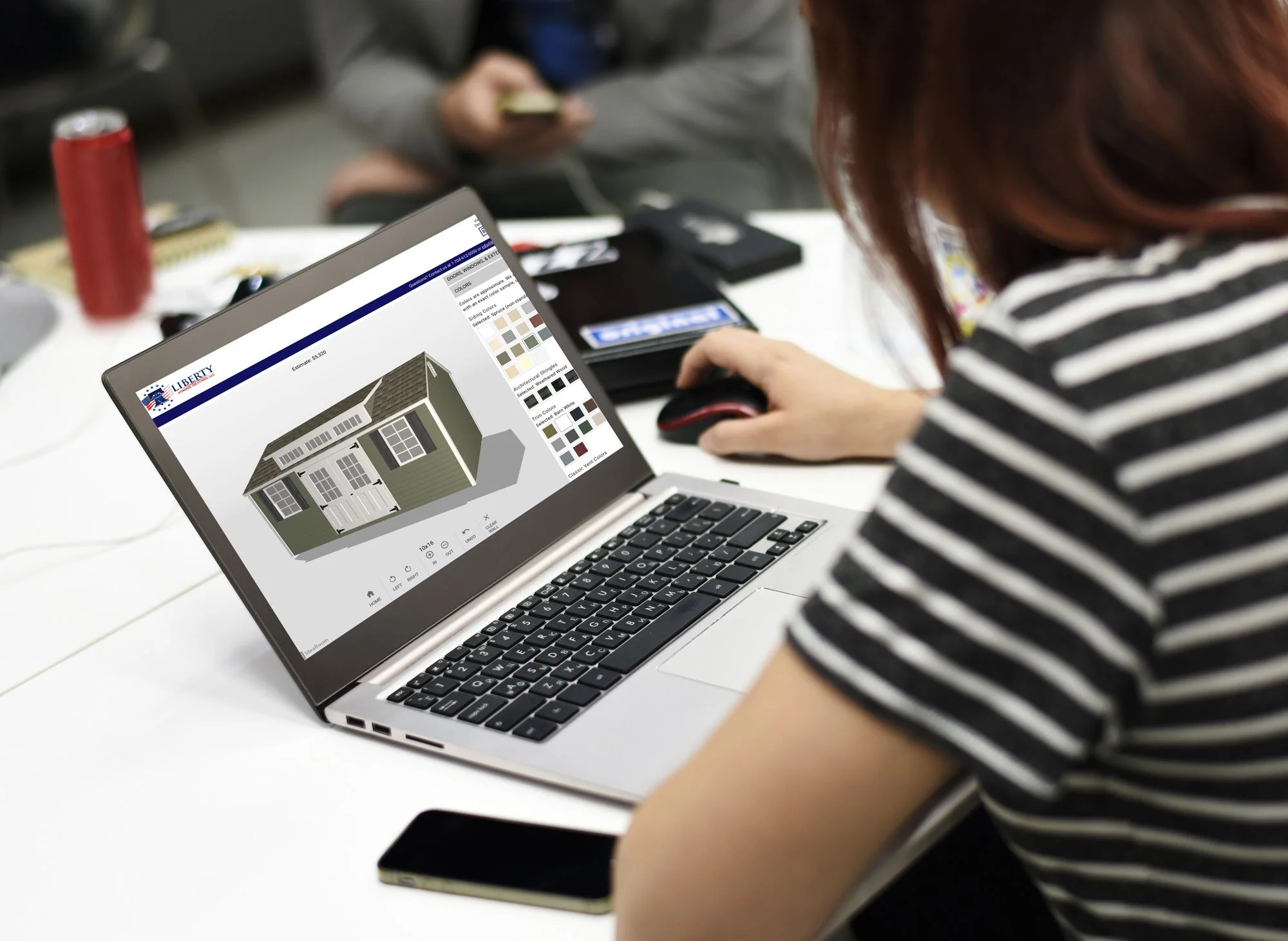 girl designing a liberty shed with the online design tool