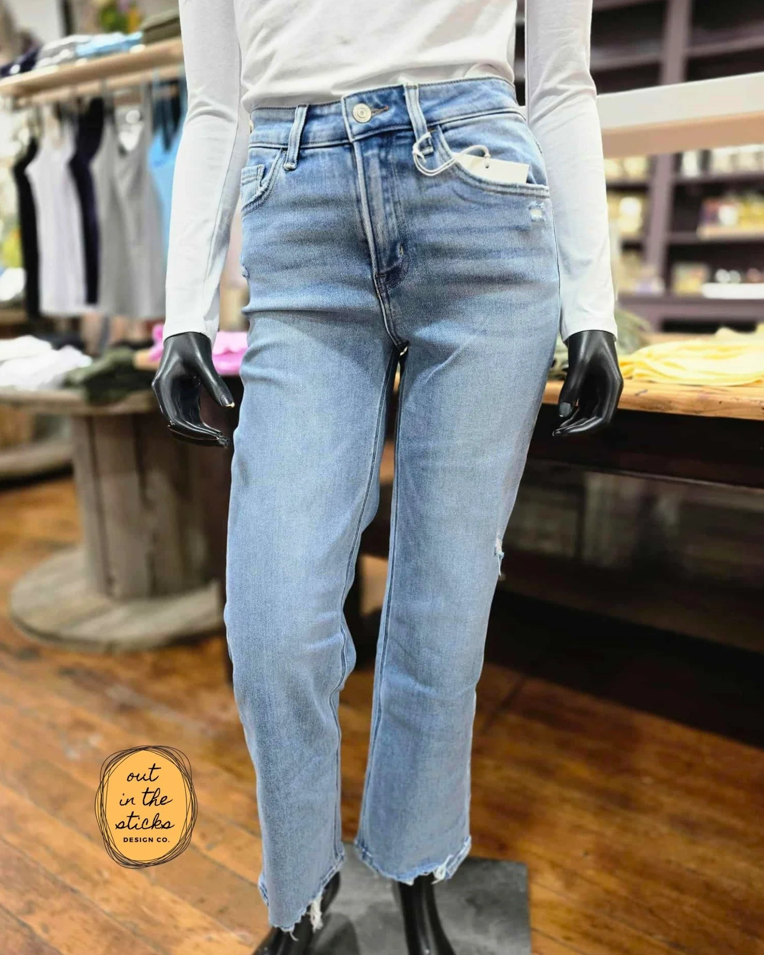 The kind of denim you&rsquo;ll wear on repeat. These high rise distressed jeans have a great fit, light wash, and a raw hem that adds just enough detail.