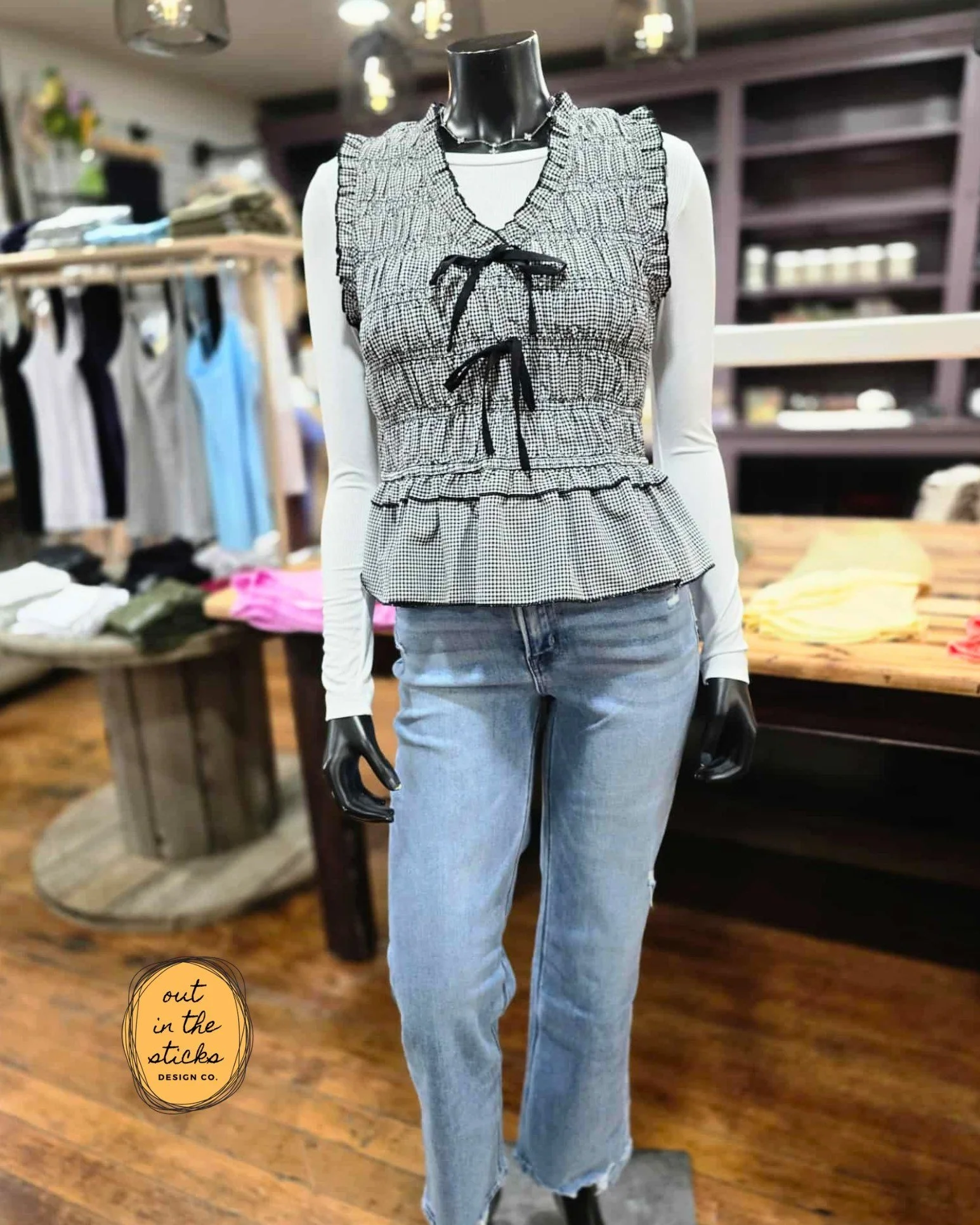 This outfit is such a fun mix of classic and cute. The gingham print, bow details, and peplum fit make it an easy favorite with denim.
We're open today 10am-5:30pm!