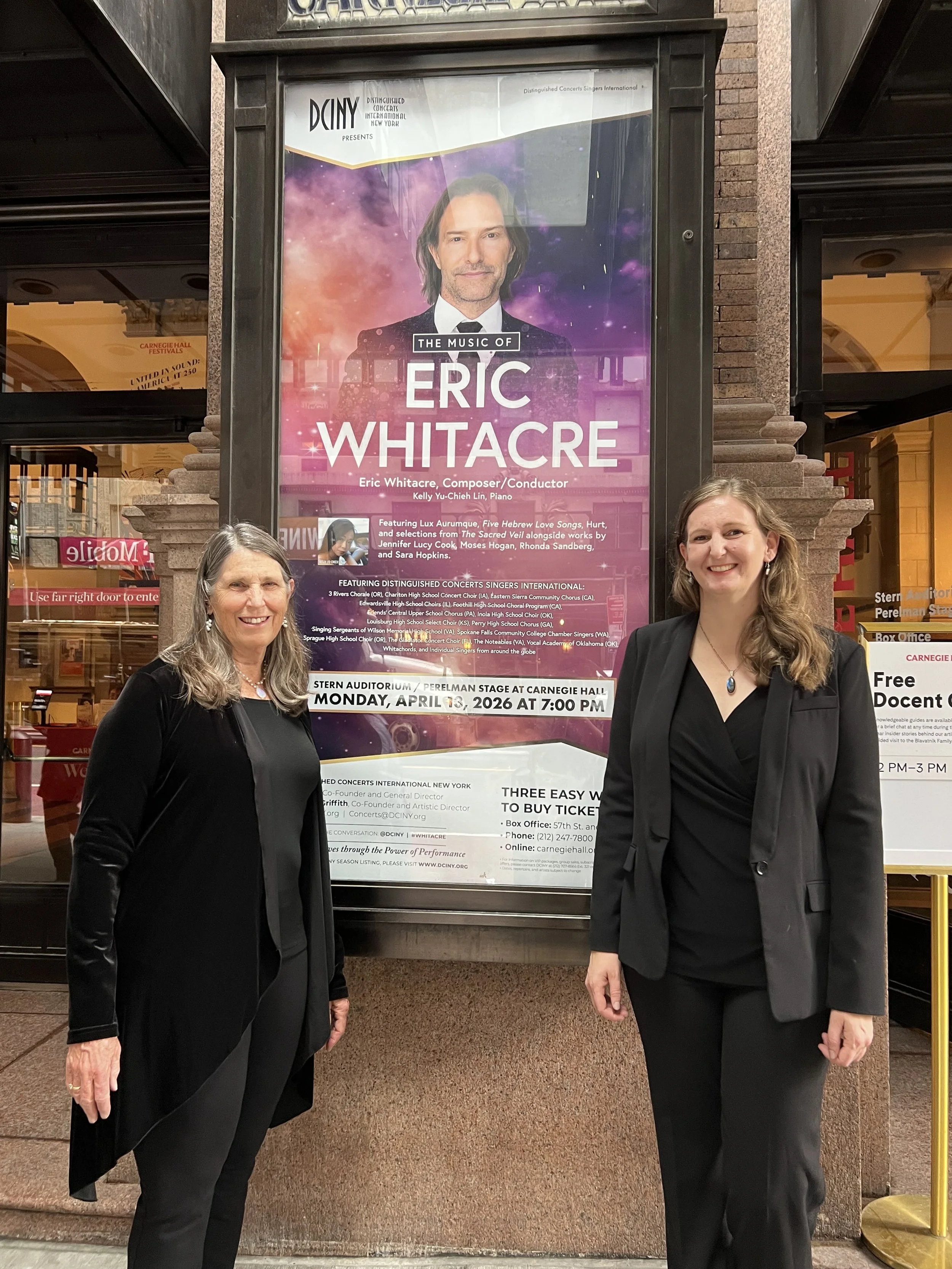  Eastern Sierra Community Chorus director Nancy Holland, and her daughter, Lily Holland, also a chorus member, in front of an Eric Whitacre concert poster at Carnegie Hall.&nbsp;  Heidi Leary/Courtesy 