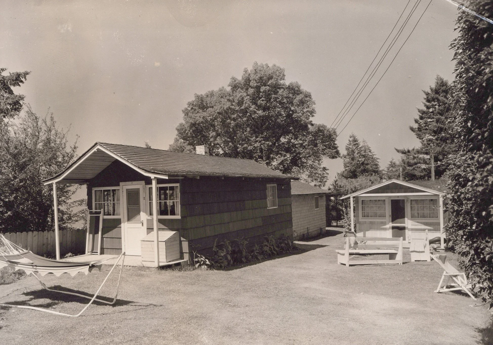 Historical black and white of several cabins at Chevy Chase Beach Cabins
