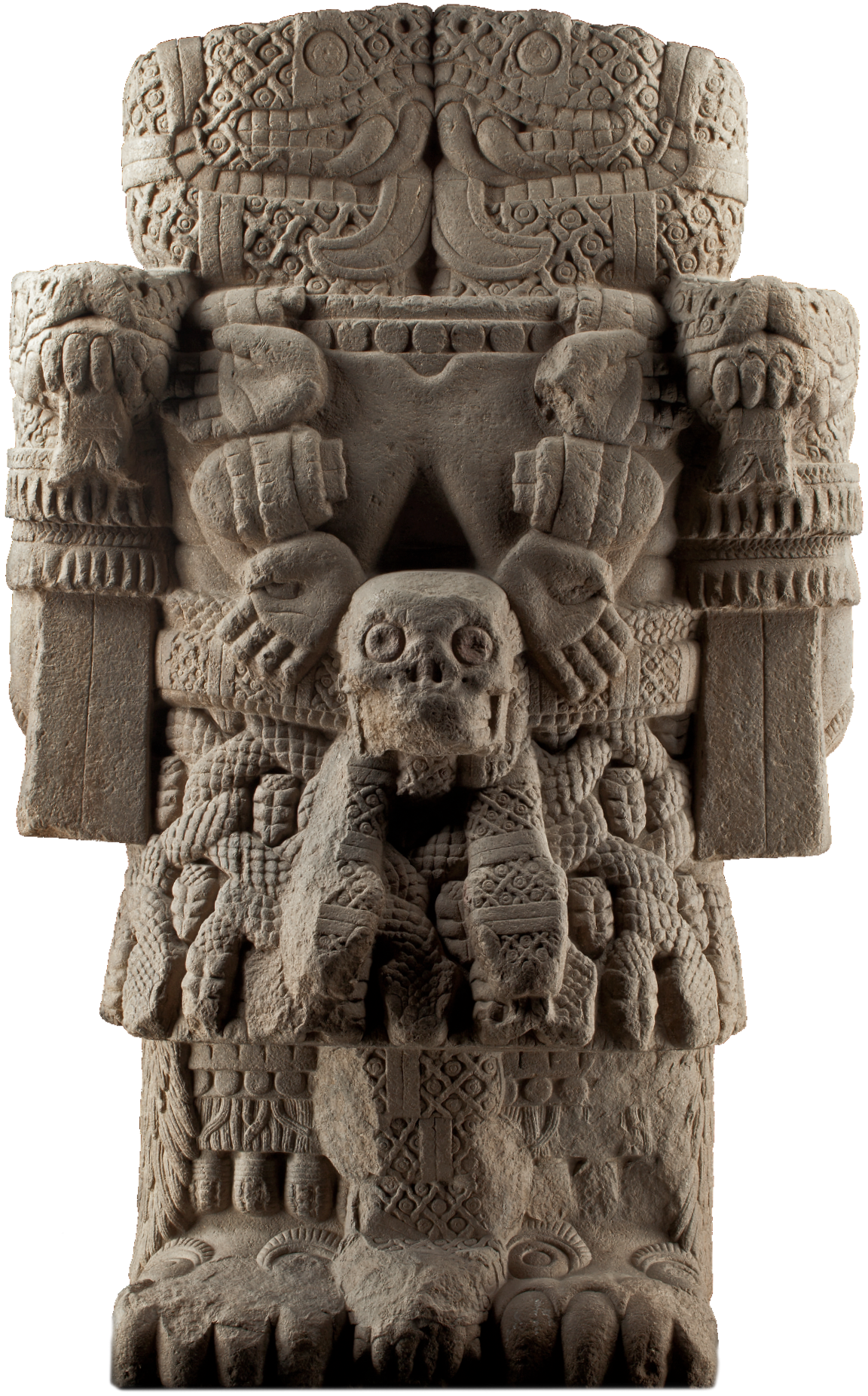 Stone statue of a deity with intricate carvings and a skull motif, likely representing an ancient Mesoamerican culture.