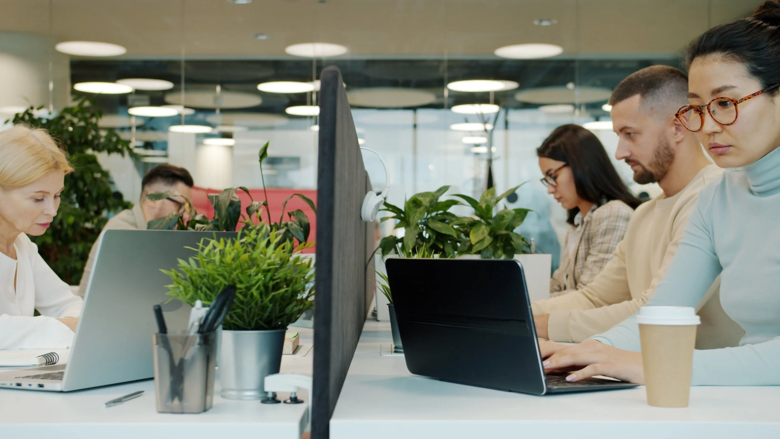 a group of people working on a table