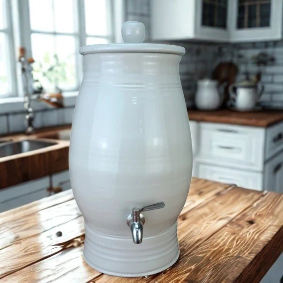 Enjoy pure, great-tasting water with our Mary Valley ceramic water filters, handcrafted by @peter_wallace_pottery  in Queensland.

Each gravity-fed filter is hand-thrown from clay and finished in the glaze 'Coconut' as shown in the image.

Designed t